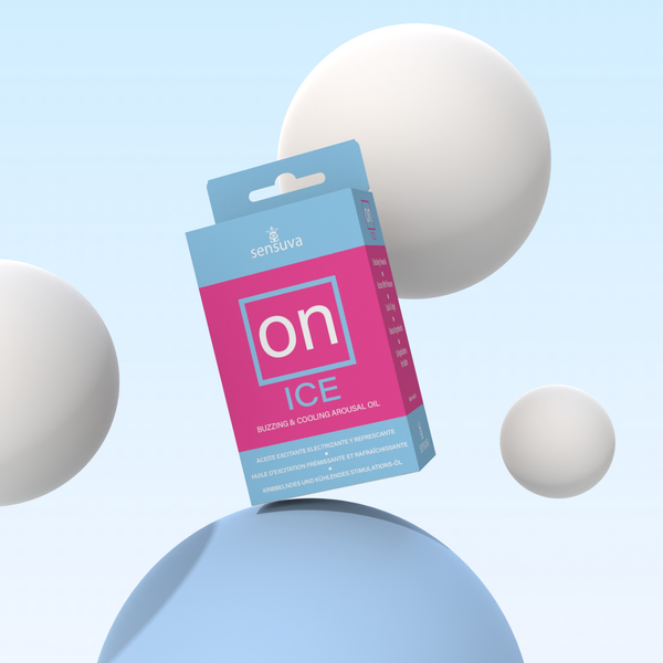 The boxed Sensuva ON ICE Arousal Oil package floats dynamically at an angle on a light blue dome. Smooth white spheres of various sizes hover in the background against a soft pastel sky-blue backdrop.