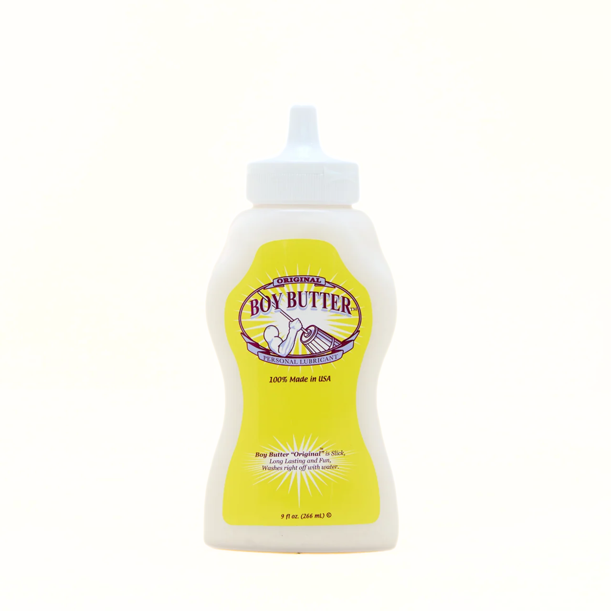 A shot of the front of the Boy Butter Original Personal Lubricant. The white, contoured, squeeze bottle has a white nozzle and a yellow label featuring the "Boy Butter" logo with a stylized image of a person churning butter, and text stating "ORIGINAL PERSONAL LUBRICANT" and "100% Made in USA." Imagen principal del producto