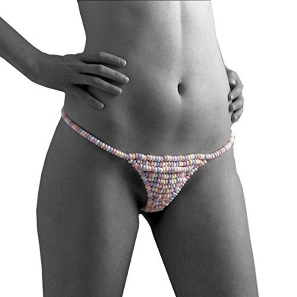 Full studio shot of a model wearing the pastel-colored candy g-string against a plain background.