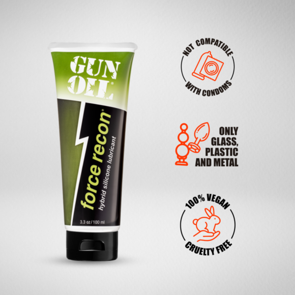 Front product image of 'Gun Oil Force Recon' tube with icons indicating it is not compatible with condoms, only safe for glass/plastic/metal toys, 100% vegan, and cruelty-free.