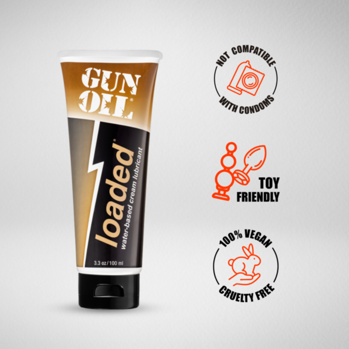 Product image of 'Gun Oil Loaded' water-based cream lubricant tube with icons indicating it is not compatible with condoms, toy friendly, 100% vegan, and cruelty-free