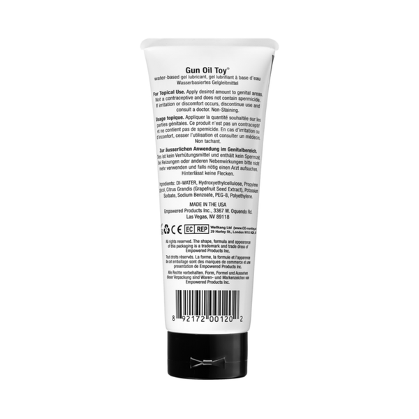 Image of the back of the 'Gun Oil Toy' lubricant tube showing usage instructions and ingredients.