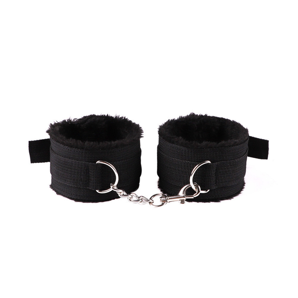 Two black plush-lined cuffs linked by a short chain and clip.