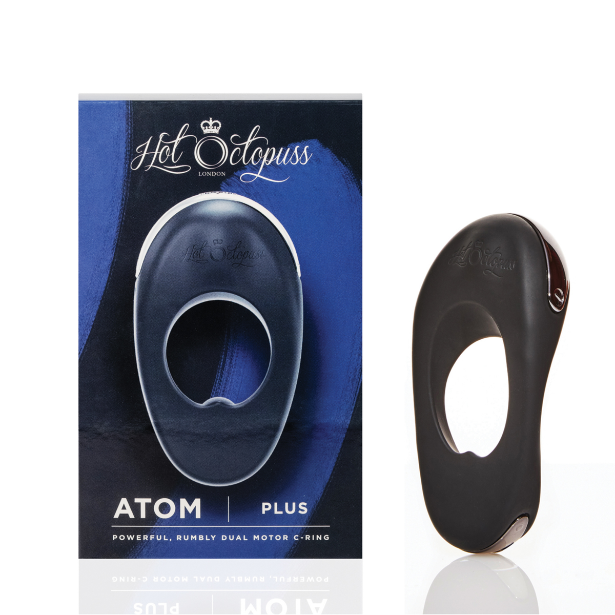 Product set view showing the black Hot Octopuss Atom Plus vibrating c-ring standing next to its blue and black retail packaging box. Main image