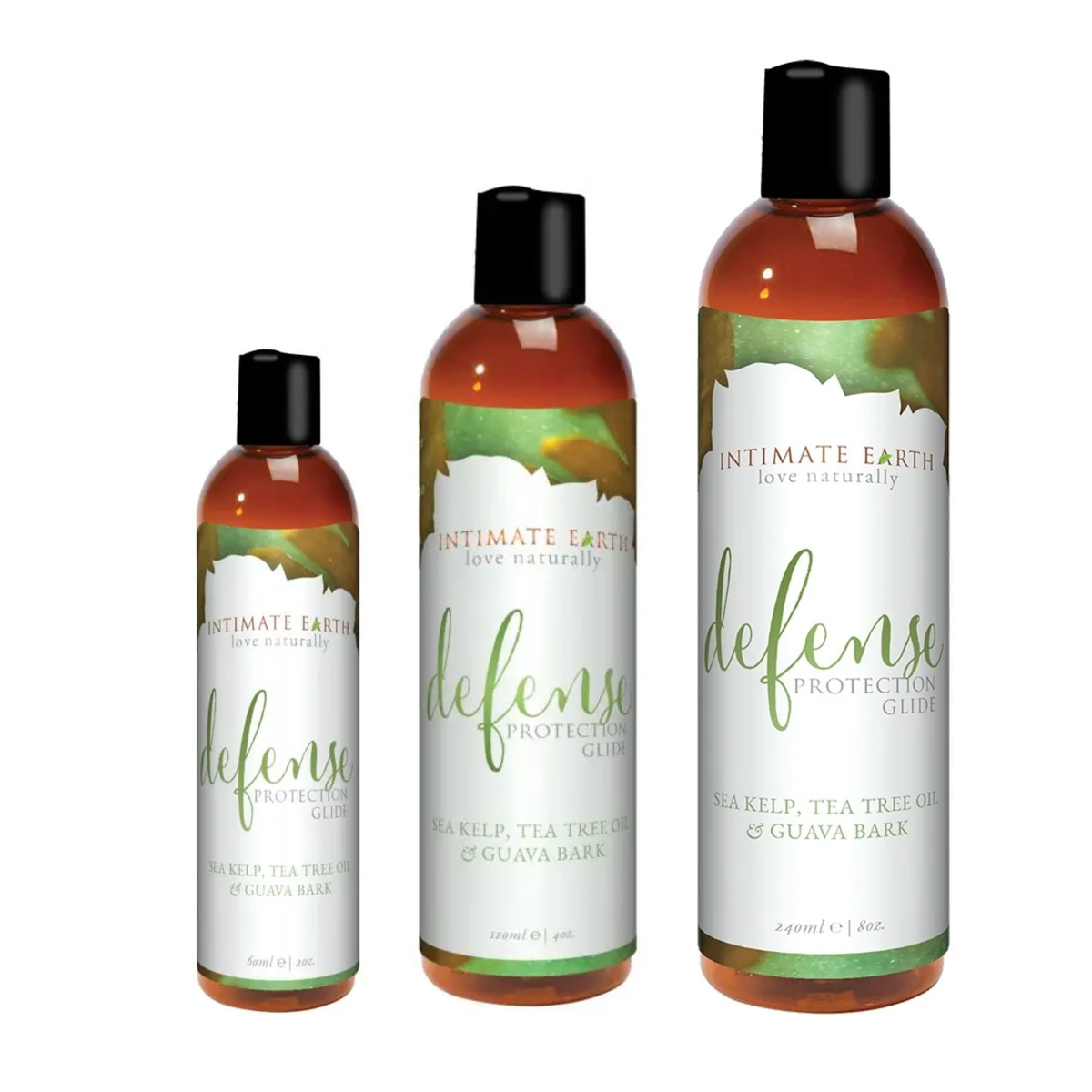 Size comparison view showing three amber bottles of Intimate Earth Defense protection glide standing side by side in 60 ml (2 fl oz), 120 ml (4 fl oz), and 240 ml (8 fl oz) capacities. Imagen principal del producto