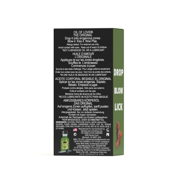 The back of the product packaging, showing instructions in multiple languages (English, French, Spanish, and German). The text directs users to "Drop it onto erogenous zones. Blow it. Kiss it. Now Play." A list of ingredients is provided at the bottom, including glycerin, propylene glycol, and cinnamon cassia leaf oil, along with the manufacturer's contact information in California.