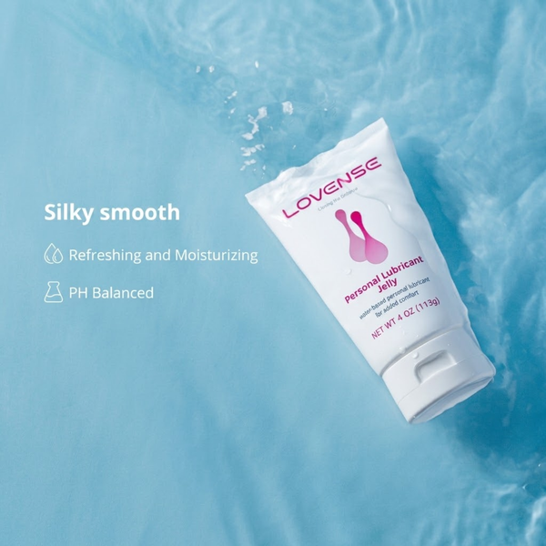Mood shot of the Lovense Personal Lubricant Jelly tube floating in clear blue water, accompanied by text highlighting "Silky smooth", "Refreshing and Moisturizing", and "PH Balanced".