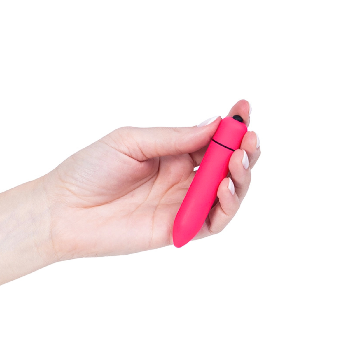 Scale reference photo showing a hand holding the compact bright pink bullet vibrator between its fingers against a plain white background.