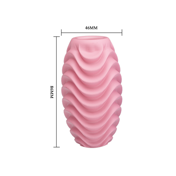 Dimension graphic displaying the pink wavy masturbation sleeve with height measurement markings of 86 mm and a top width of 46 mm.