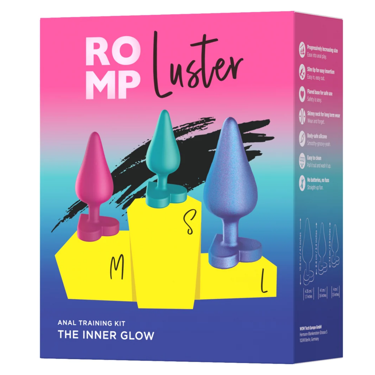 Front retail box packaging shot for the ROMP Luster Anal Training Kit "The Inner Glow", illustrating the three sizes (S, M, L) on a yellow podium with key feature callouts along the side. Imagen principal del producto