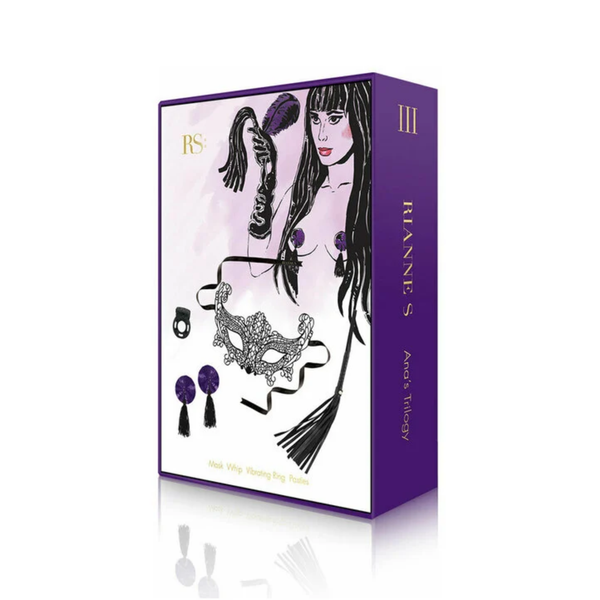 Purple book-style gift box artwork featuring an illustrated woman holding a whip alongside graphics of the kit's contents: mask, whip, vibrating ring, and pasties.