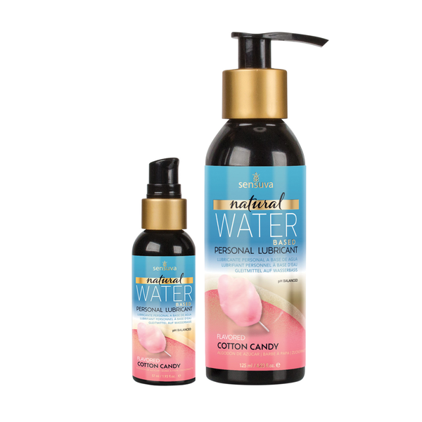 Two dark bottles of Sensuva Natural Water Based personal lubricant are displayed side-by-side against a white background. Both feature vibrant blue labels with gold accents and a pink cotton candy illustration.