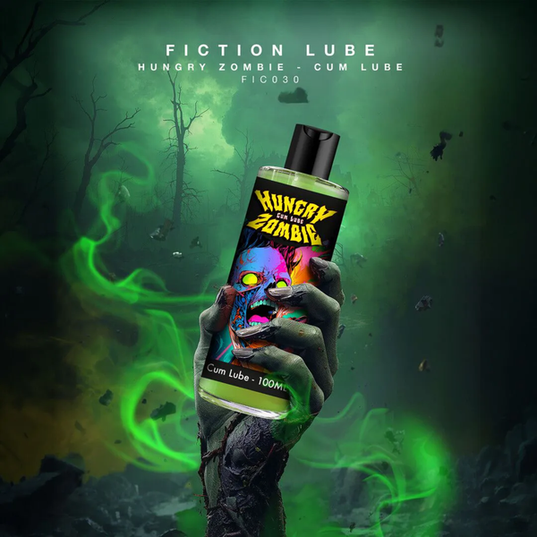 Promotional artwork depicting a decaying zombie hand reaching out from a misty, green-glowing graveyard scene while holding a bottle of Hungry Zombie Cum Lube.