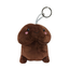 Front studio shot of a 3.94-inch brown plush novelty toy shaped like a stylized penis with an embroidered smiling face, pink blushing cheeks, a grey ribbon loop, and a metal key ring attached at the top.