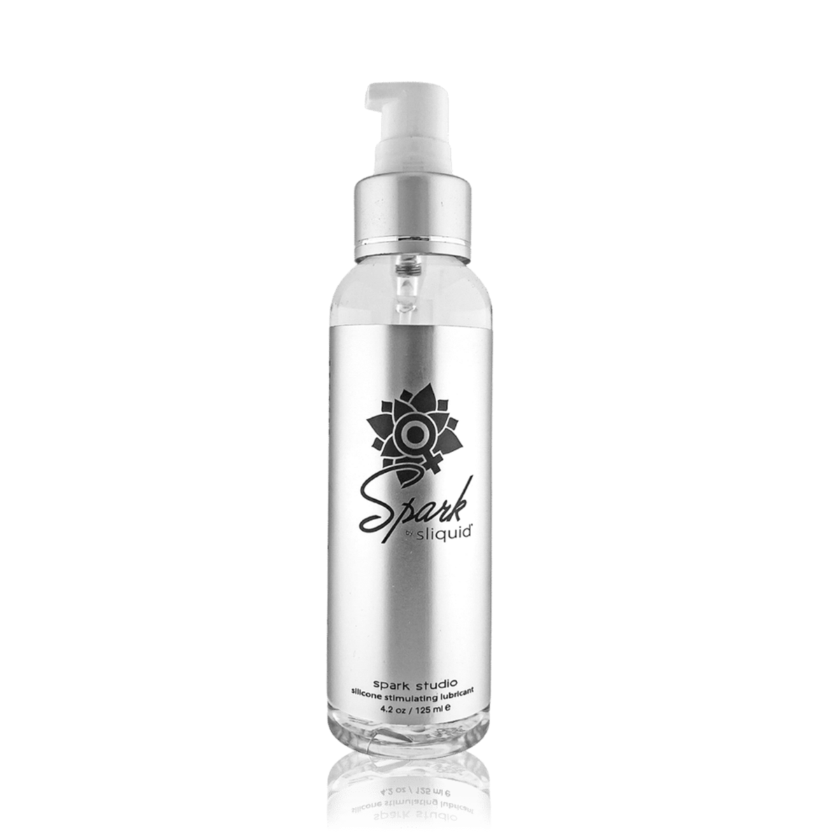 Front studio product shot of the clear 4.2 fl oz (125 ml) bottle of Sliquid Spark Studio silicone stimulating lubricant, shown uncapped to reveal the white pump top, with a subtle surface reflection below.