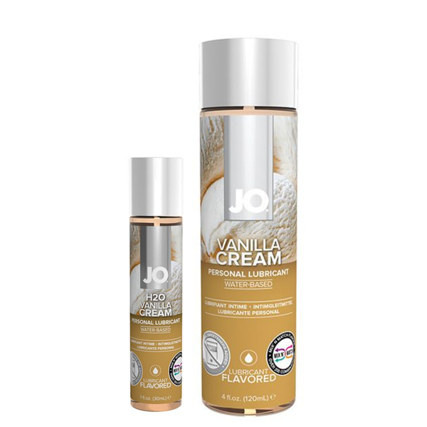 Front view of two cylindrical bottles of System JO H2O Vanilla Cream water-based personal lubricant, standing side-by-side against a white background. The smaller 30 ml (1 fl. oz.) bottle is on the left, and the larger 120 ml (4 fl. oz.) bottle is on the right. Both feature clean white caps and a tan-and-brown labeled design showcasing a graphic of a textured scoop of vanilla ice cream behind the prominent white "JO" logo.