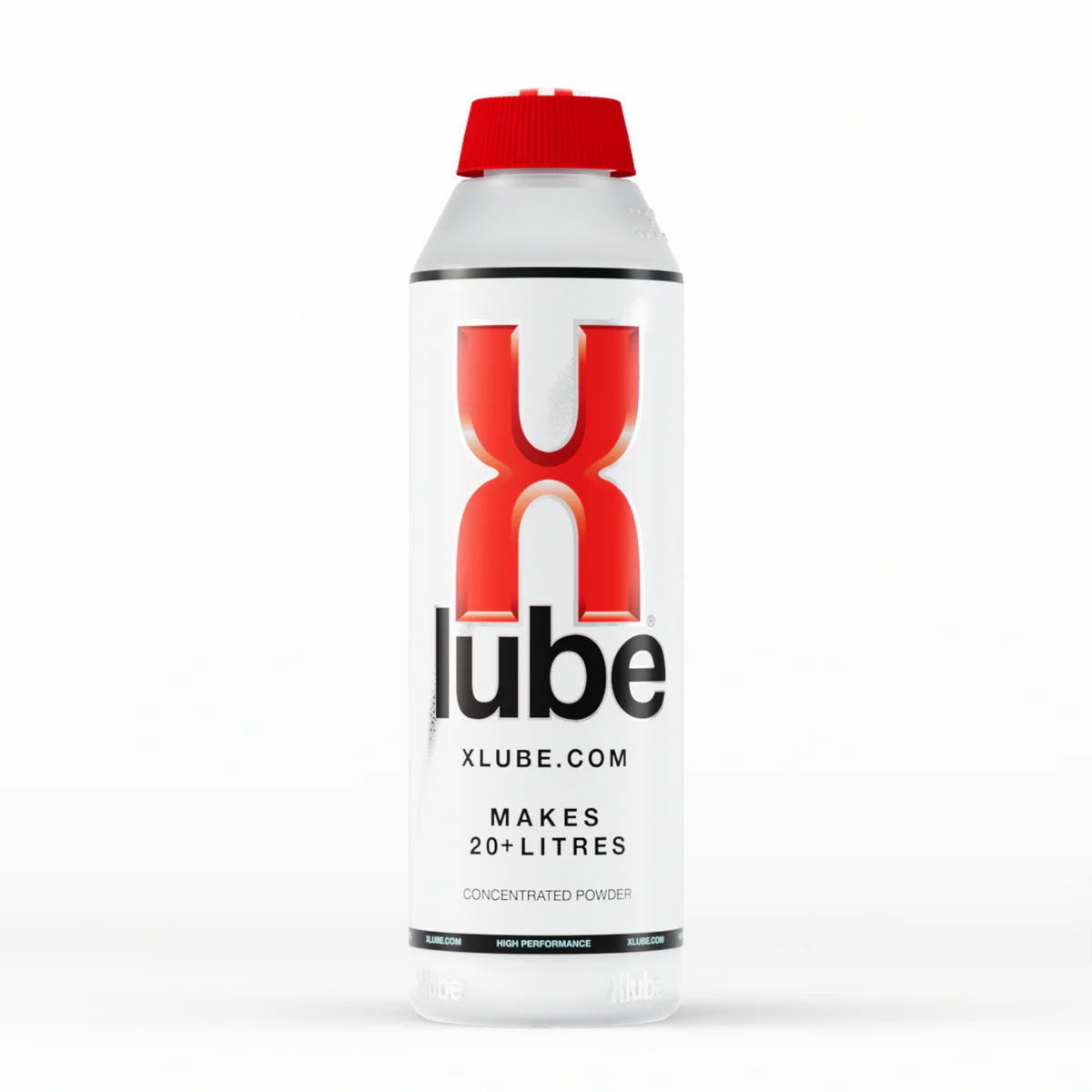 A vertical shot of a clear plastic bottle of X Lube powder lubricant in the white background. The bottle has a red cap and is primarily white with red and black text. The large red "X" and black "lube" logo is prominent in the center. Smaller text below the logo reads "Xlube.com" and "MAKES 20+ LITRES / CONCENTRATED POWDER". Main image