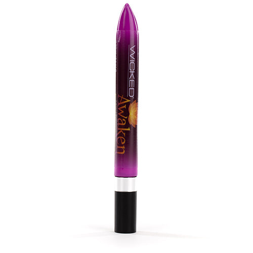 A close-up, angled studio shot of the "Awaken" stimulating clitoral massage gel tube standing upright against a white background. The front of the glossy purple tube is visible.